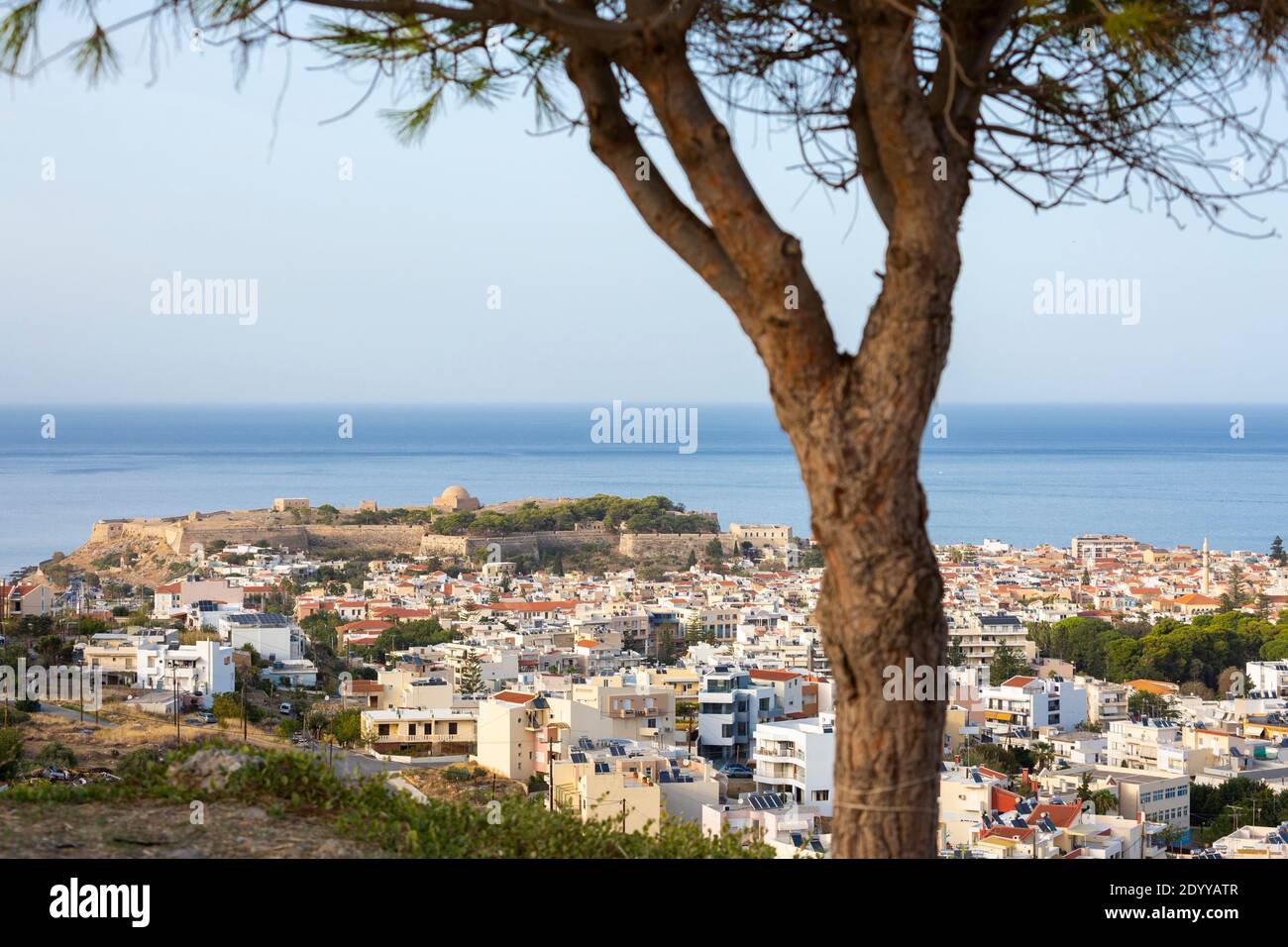 Cityscape view of Rethymno looking towards the old town, Fortezza Castle, and the sea, Crete, Greece Stock Photo