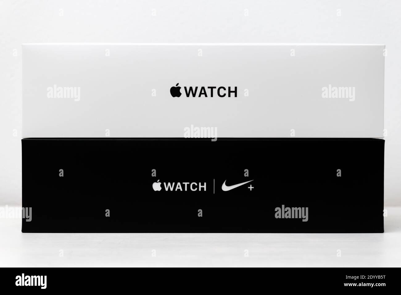 Apple watch and Apple watch Nike plus boxes, black and white, isolated on the white background. Unboxing process. December 2020, San Francisco, USA Stock Photo