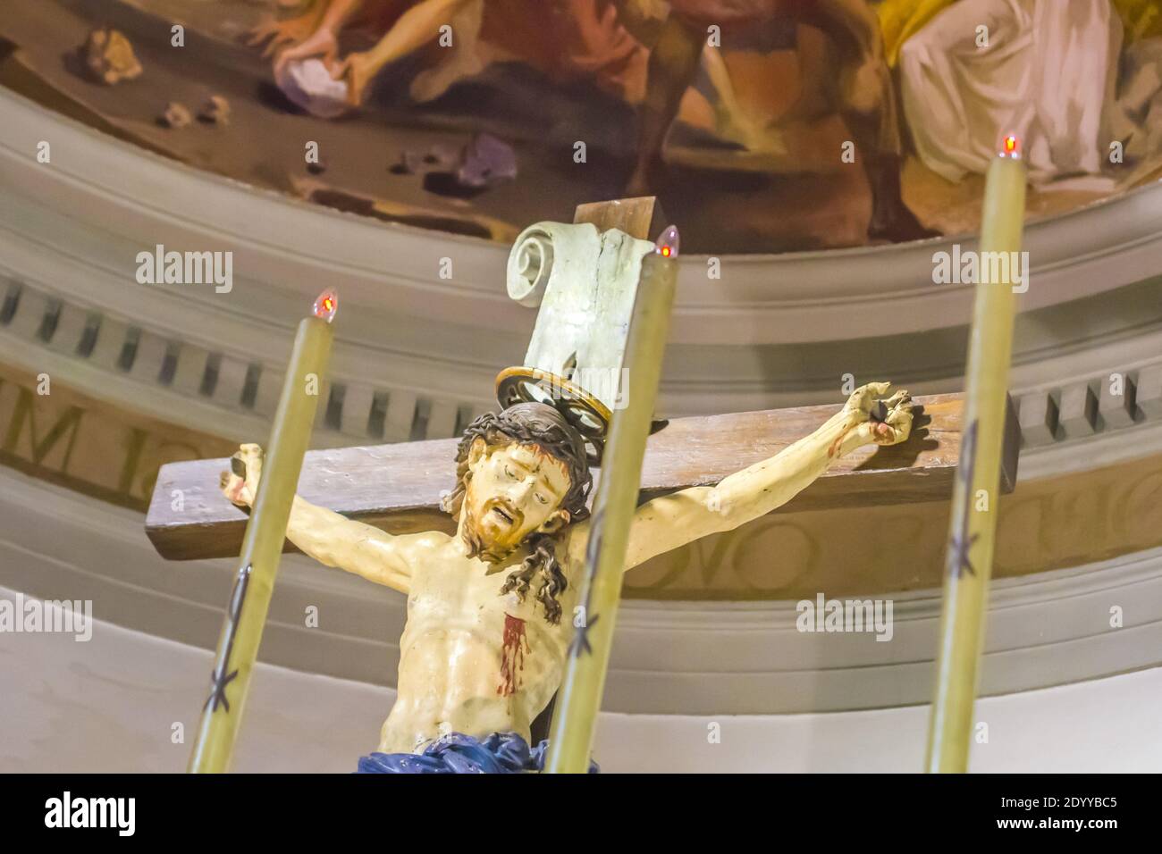 statue of jesus christ and his cross dead and resurrected for our salvation  adored by the faithful Stock Photo - Alamy