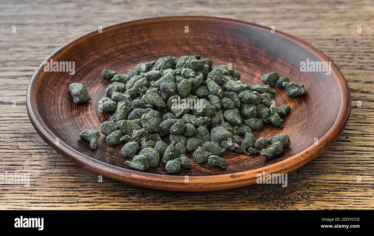 selective focus photo of real chinese ginseng oolong. premium green ...
