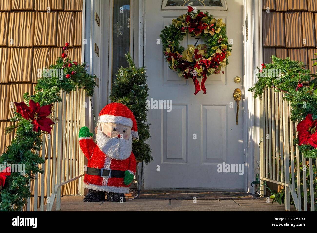 Christmas Decorations on Front Porch of an Urban Townhouse Stock Photo