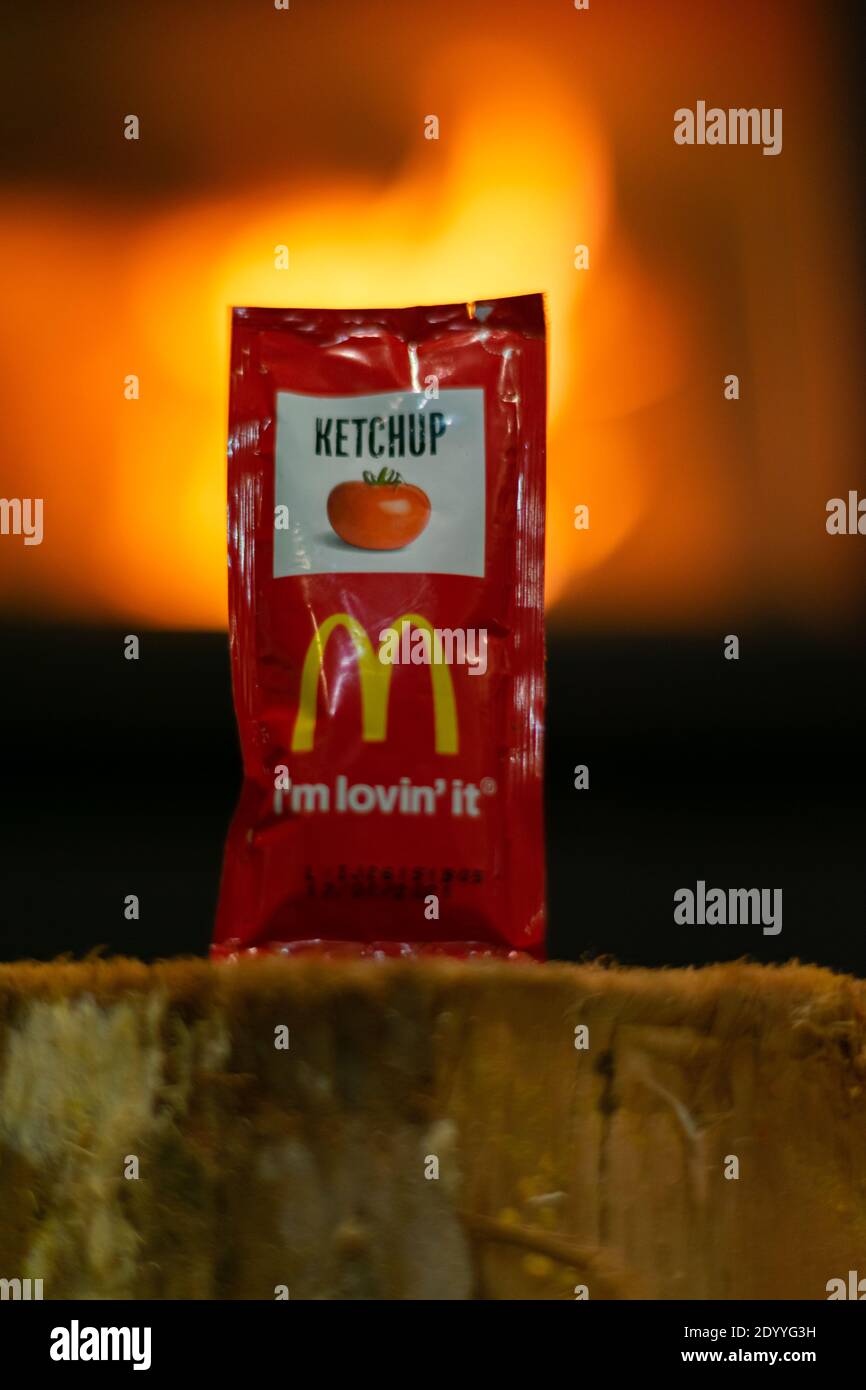 McDonald's ketchup bag in front of fireplace Stock Photo