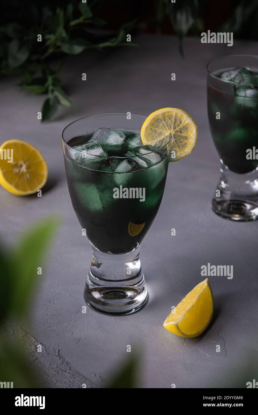 Green mocktails with chlorella or spirulina algae, lemon juice, mineral