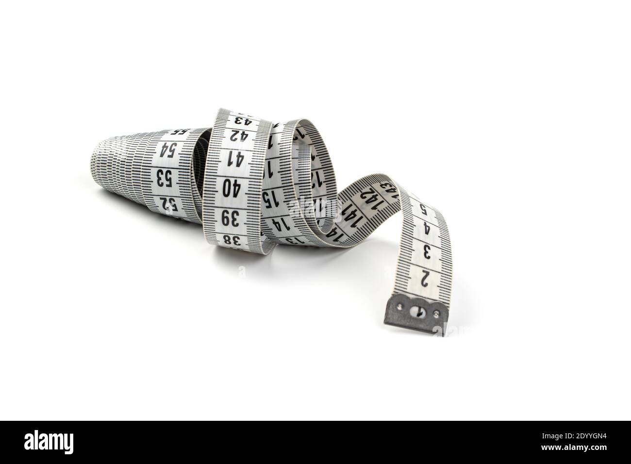 A flexible folded centimeter is isolated on a white background. Stock Photo