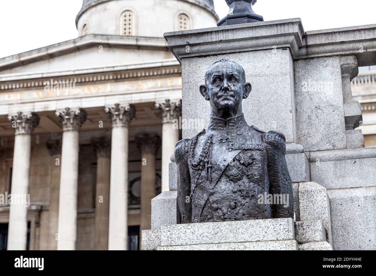Bronze bust of Andrew Cunningham, 1st Viscount Cunningham of Hyndhope in Trafalgar Square in front of the National Gallery, London, UK Stock Photo