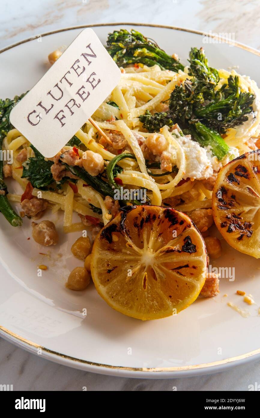Linguine pasta with Italian sausage chickpeas and broccolini in a