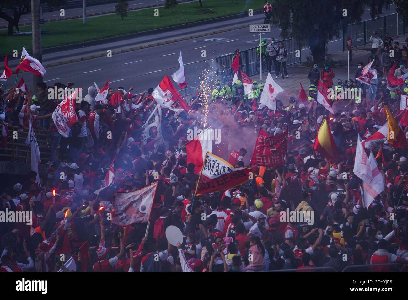 Independiente Santa Fe fans accompany the team before the betplay cup final against the America de Cali team Stock Photo