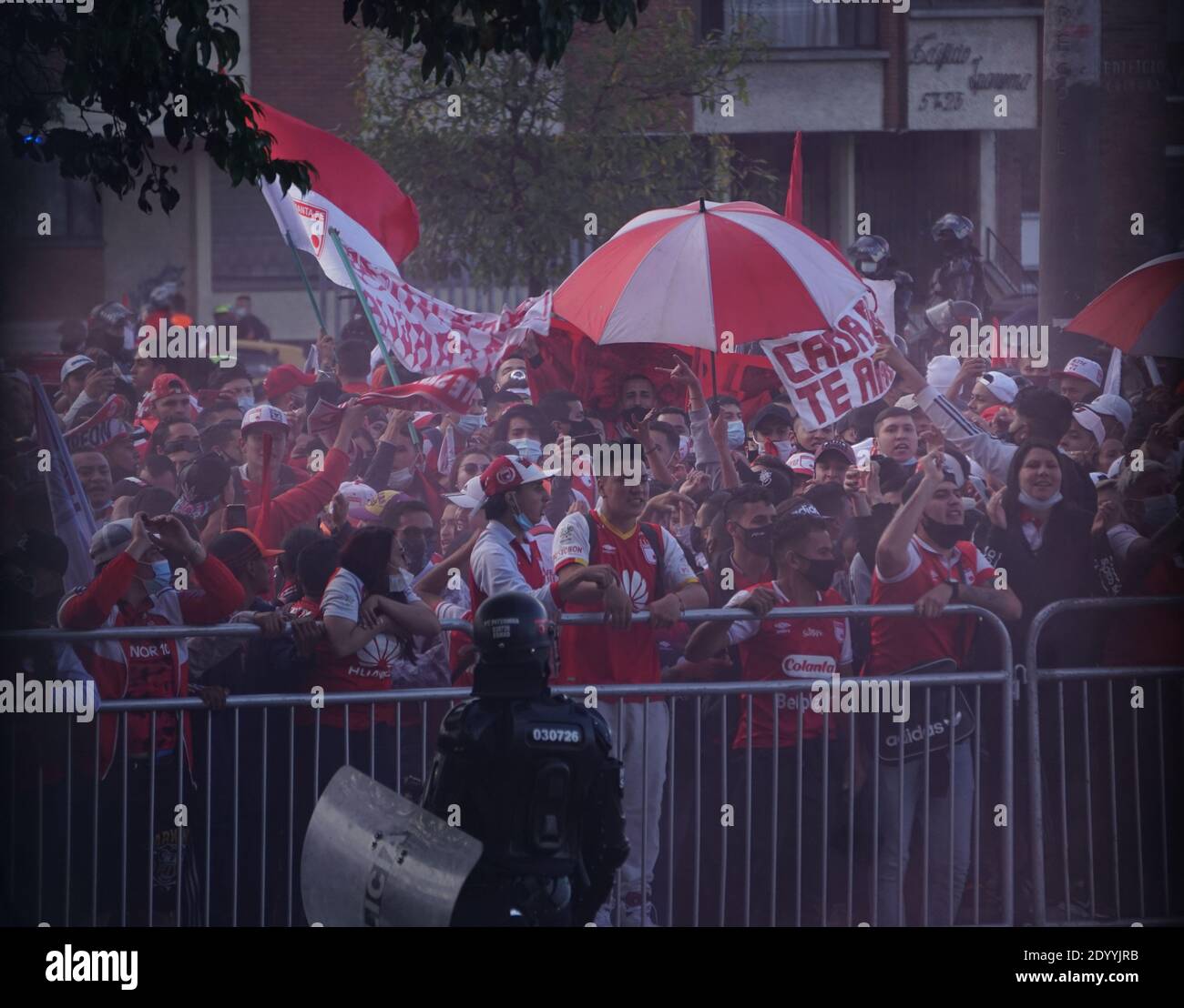 Independiente Santa Fe fans accompany the team before the betplay cup final against the America de Cali team Stock Photo