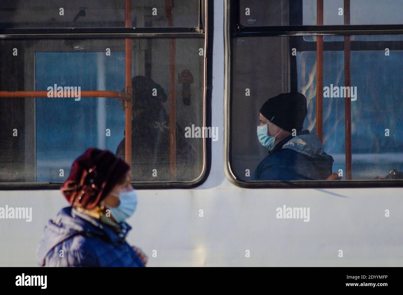 BUCHAREST, ROMANIA - 28 December 2020 - Passengers wearing facemasks on a tram as a precaution against transmission of COVID-19 in Bucharest, Romania Stock Photo