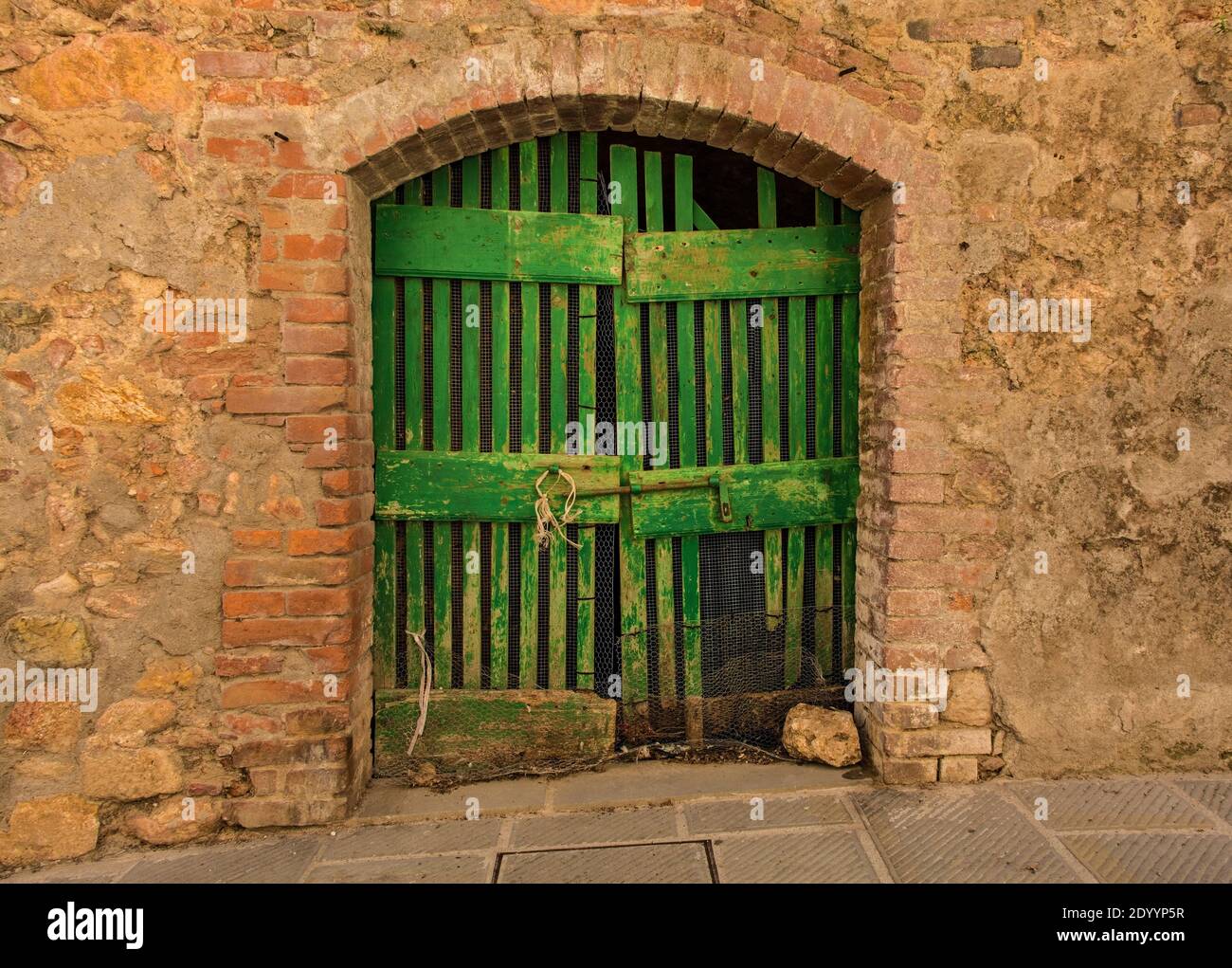 The door of a disused residential building in the historic medieval ...