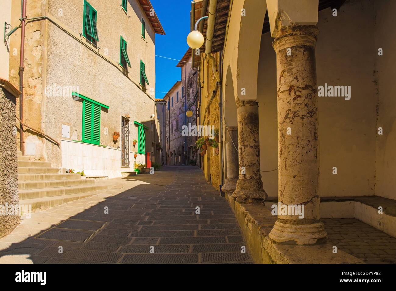 A quiet residential street in the historic medieval village of ...