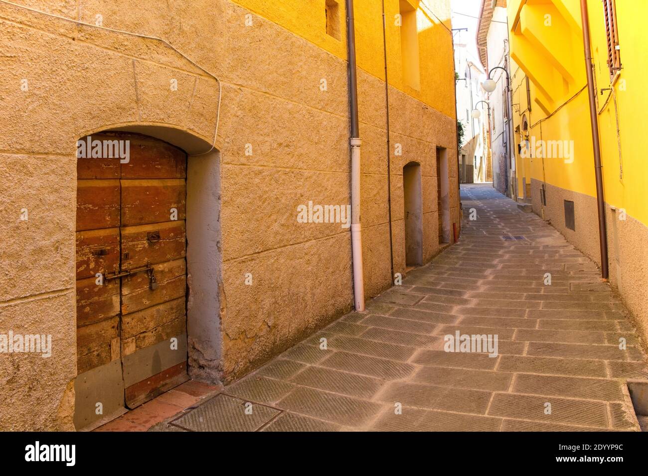 A quiet residential street in the historic medieval village of ...