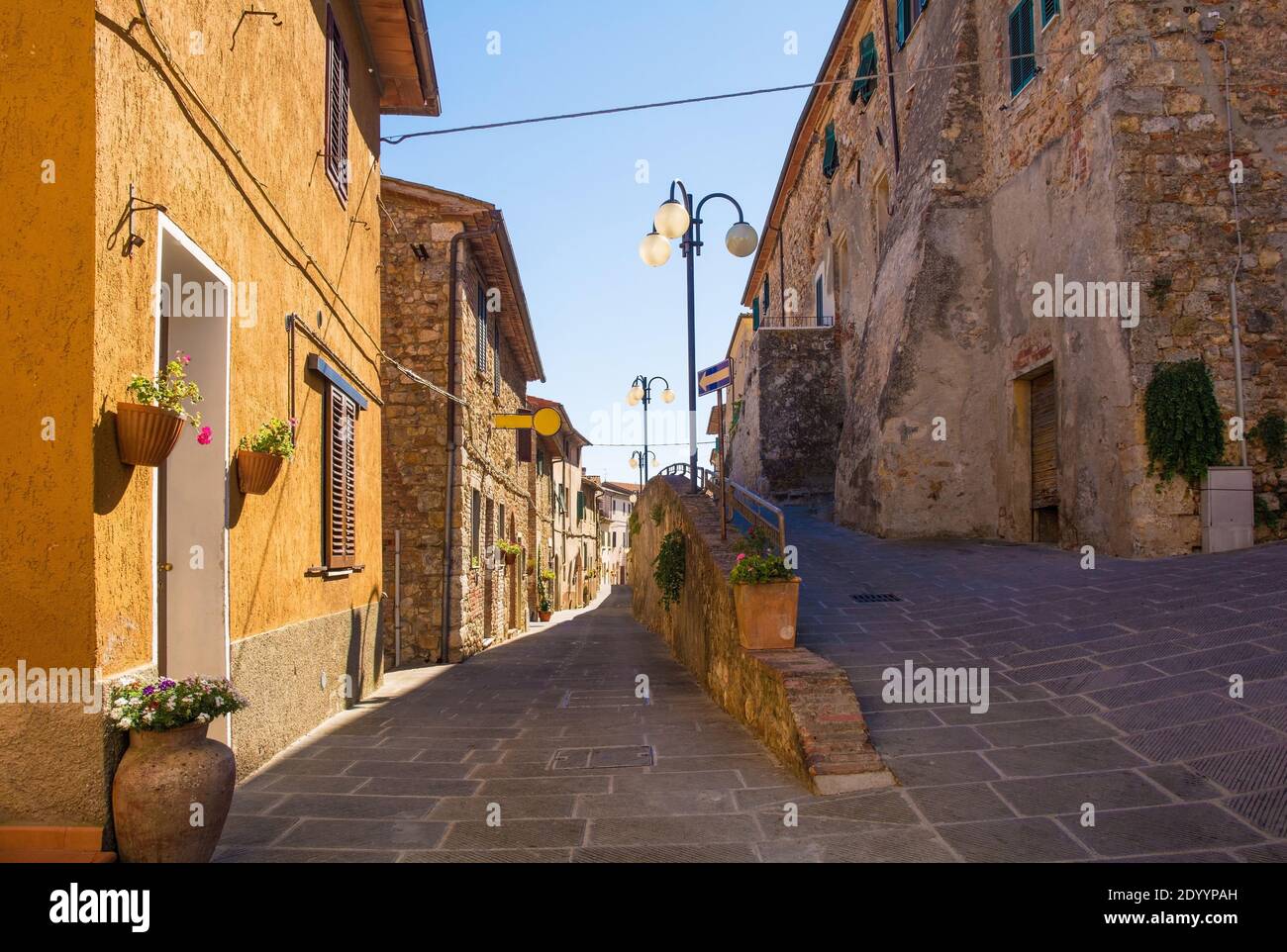 A quiet residential street in the historic medieval village of ...