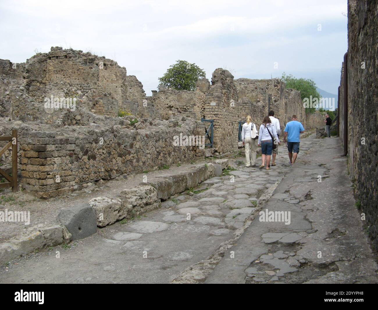 Ancient Roman Street and pavement ruins and excavations of Pompeii in ...