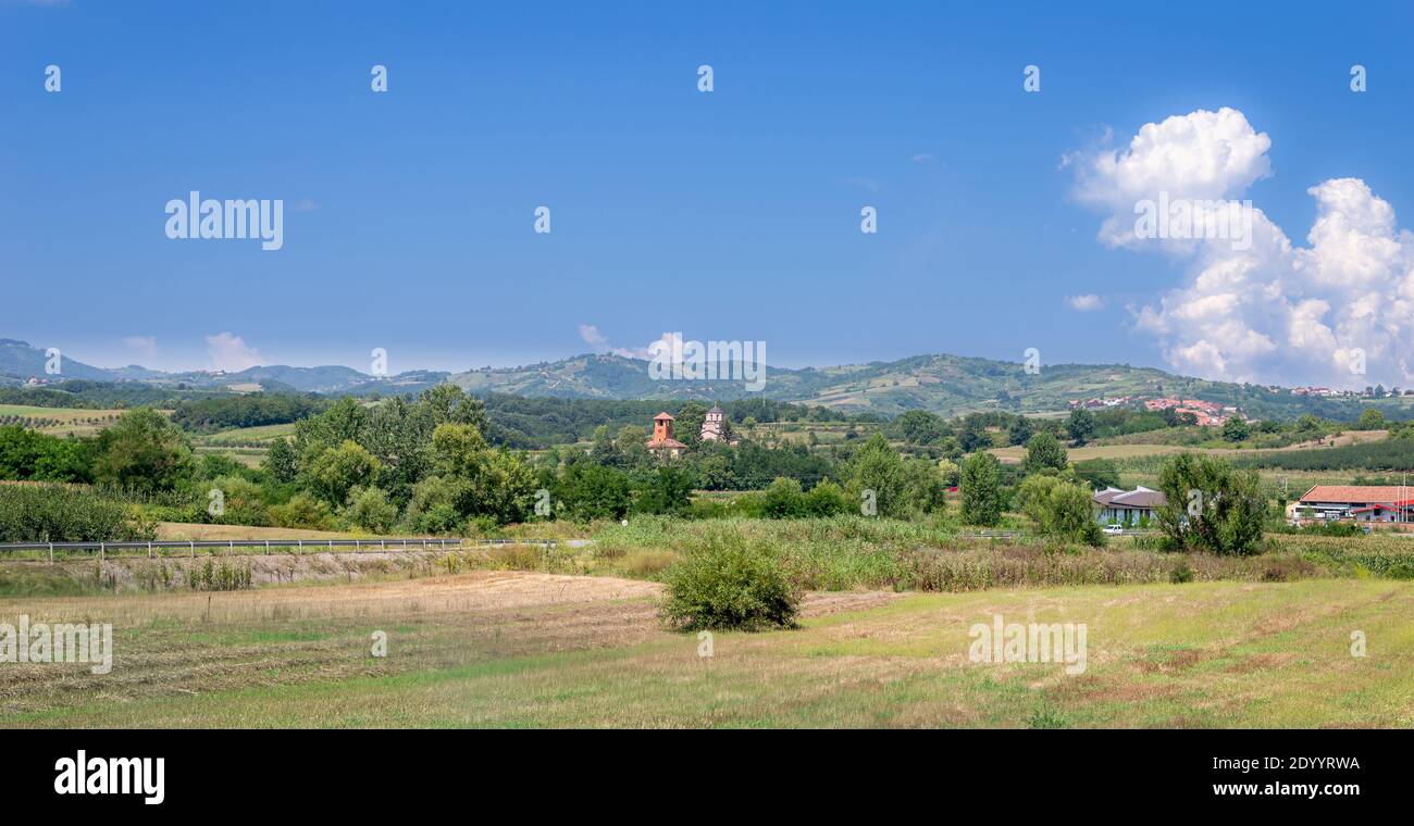 Countryside in summer - small village with church and houses Stock ...