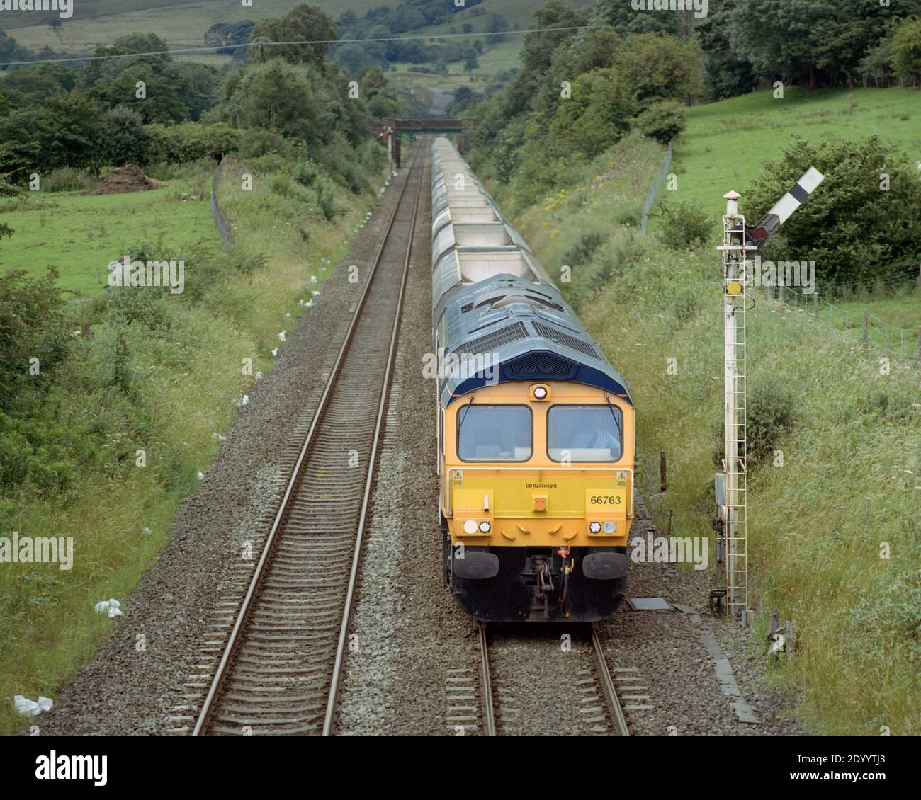 Edale, Hope Valley, UK - 18 July 2020: A freight train operated by GB Railfreight at Edale. Stock Photo
