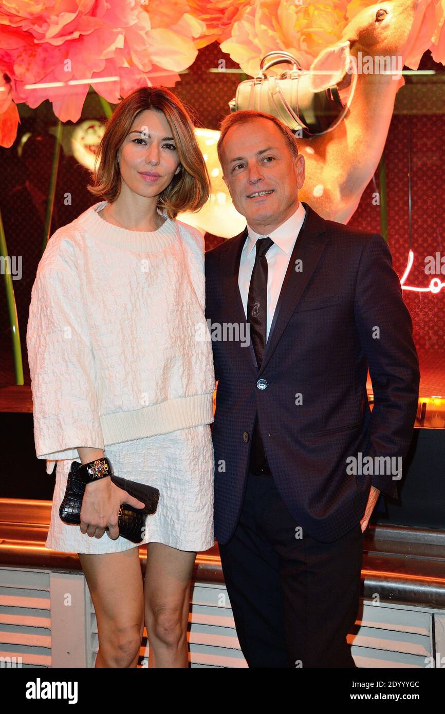 Michael Burke and wife Brigitte attending the Louis Vuitton