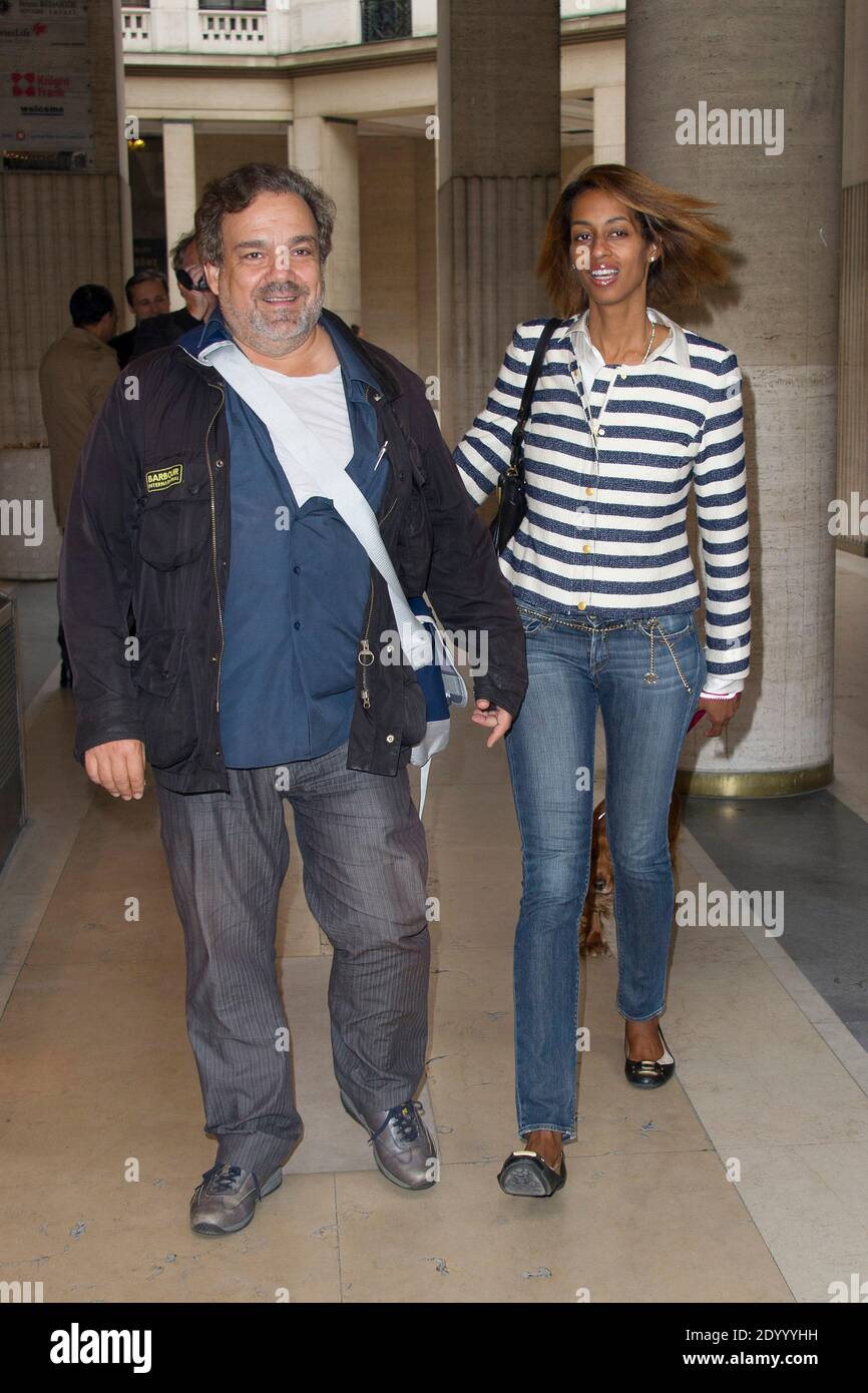 Didier Bourdon and his wife Marie-Sandra attending Jean-Charles de  Castelbajac's Spring-Summer 2014 Ready-