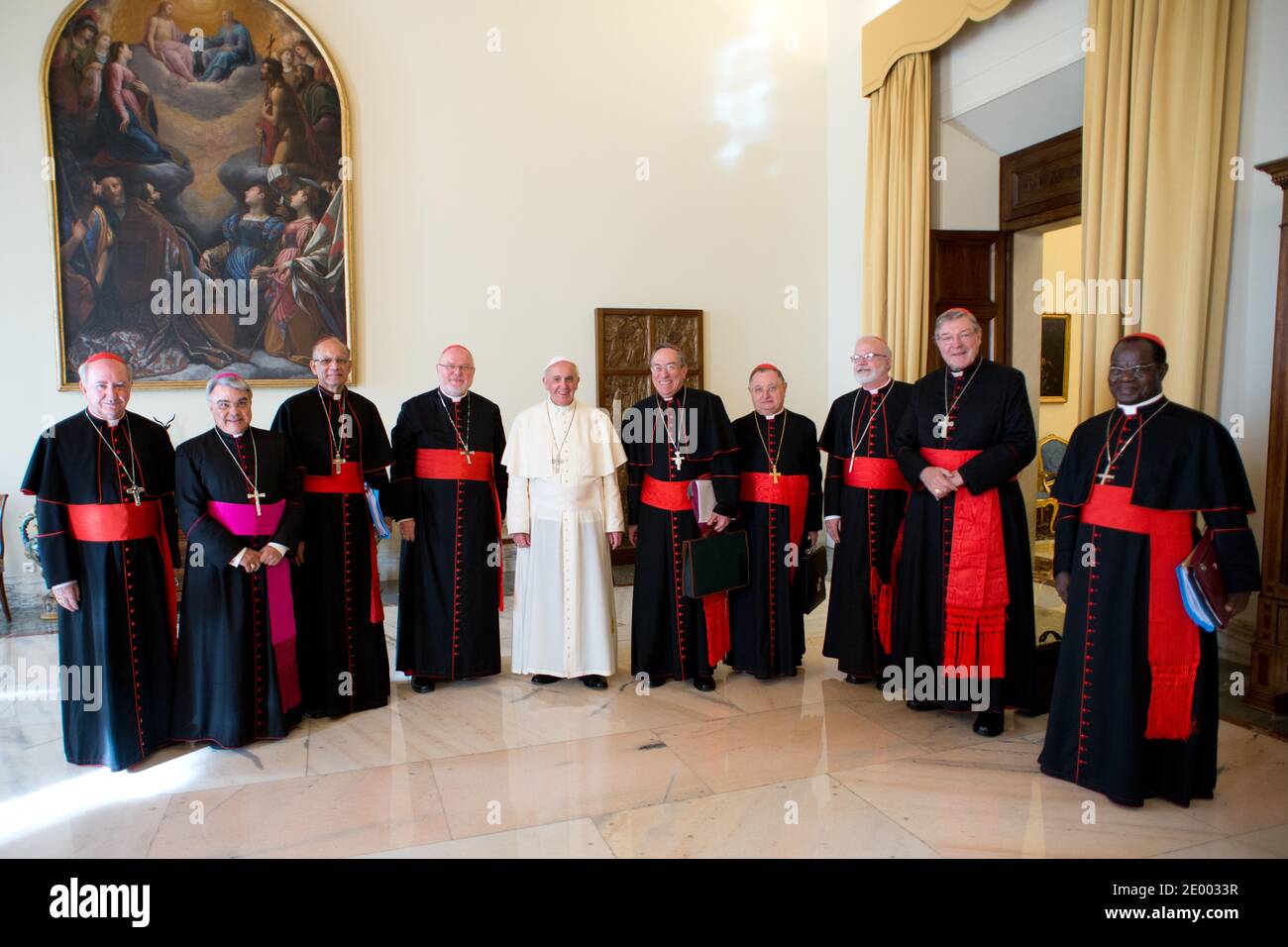File photo - Pope Francis poses with cardinals during a meeting at the Vatican on October 1, 2013 for a first round of talks on reforming the Catholic Church. Eight cardinals began closed-door meetings with Pope Francis on to help him reform the Vatican's troubled administration, the Curia, and map out possible changes in the worldwide Church. Left to right : Fancisco Javier Errazuriz Ossa, Marcello Semeraro (secretary), Oswald Gracias, Reinhard Marx, pope Francis, Andres Rodriguez Maradiaga, Giuseppe Bertello, Sean Patrick O'Malley, George Pell, Laurent Monsengwo Pasinya. The Vatican treasure Stock Photo