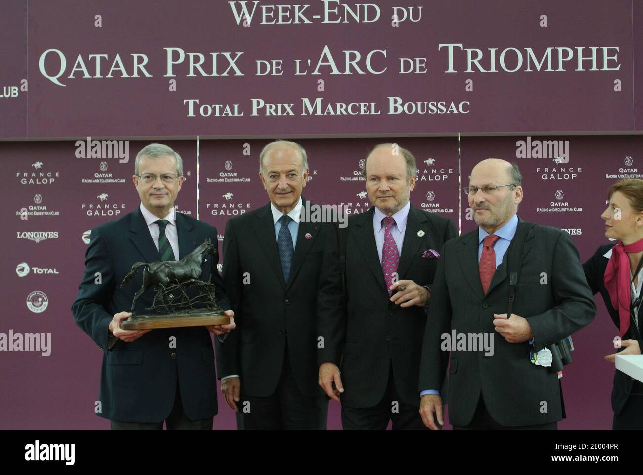 Alain (2nd from right) and Gerard Wertheimer (1st from right