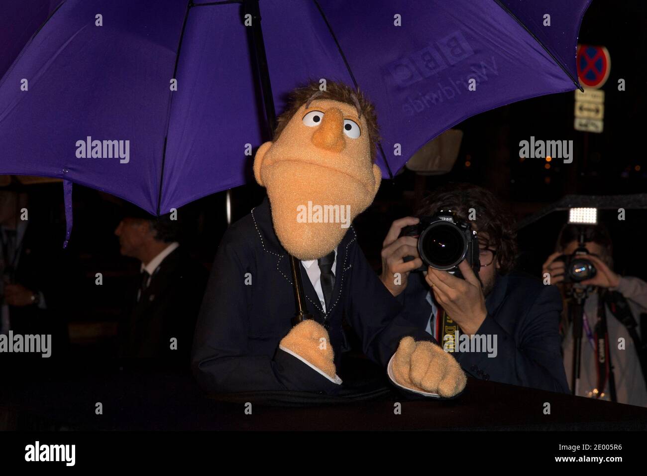 Dougie Colon (muppet host) poses during a photocall for "that puppet
