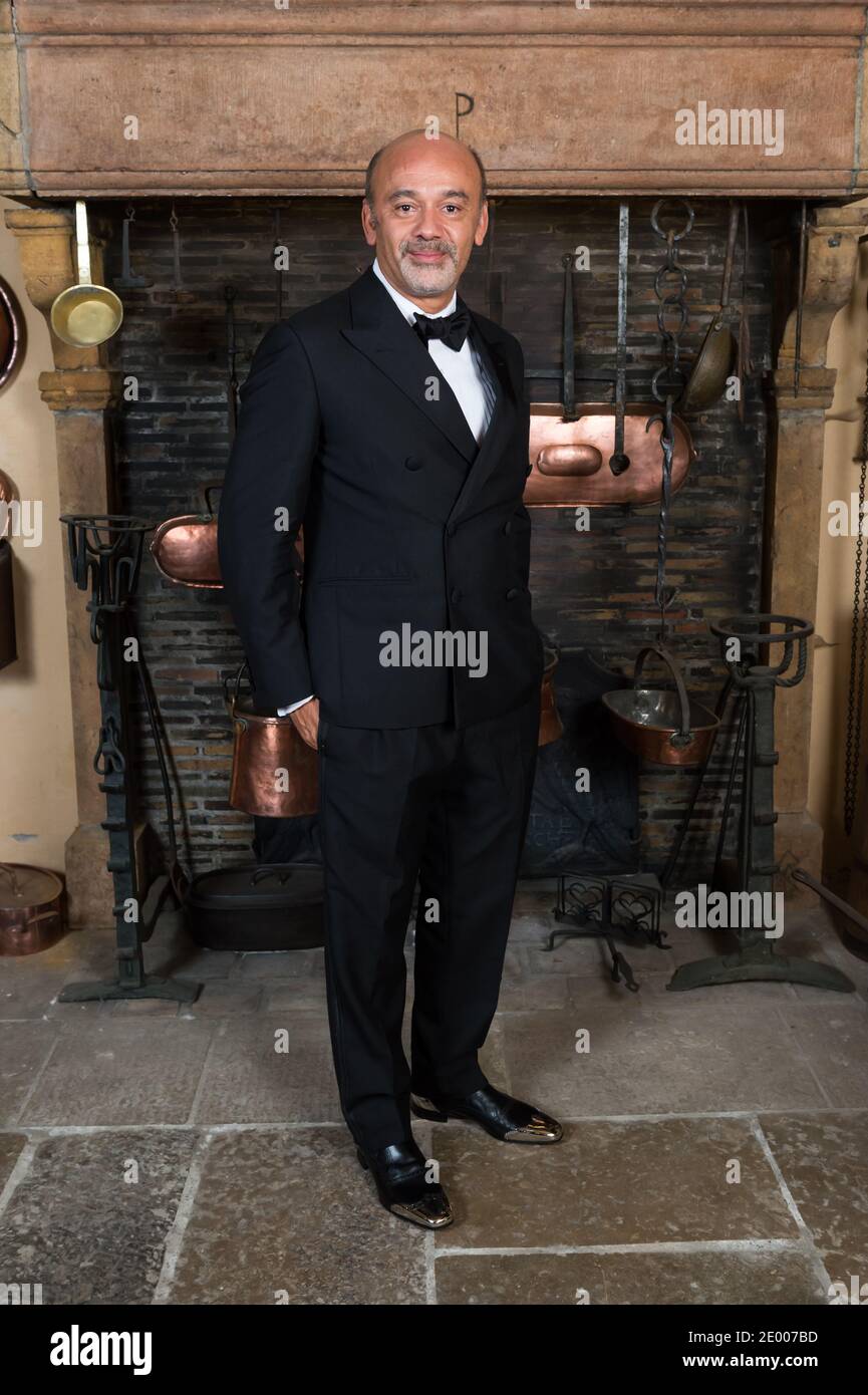 Christian Louboutin posing during the Make-A-Wish Foundation Gala ...