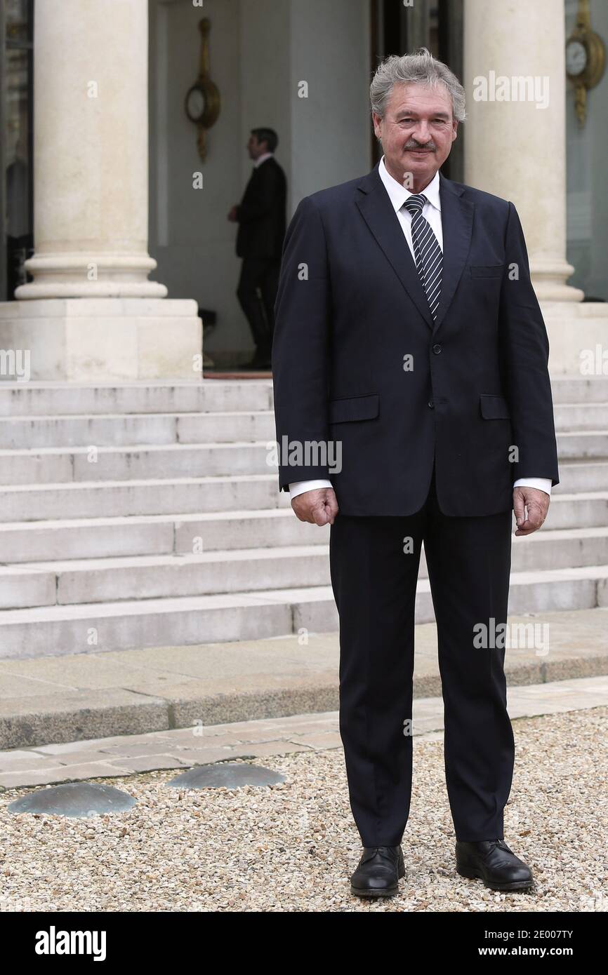 Luxembourg's Vice Prime minister and Foreign Affairs minister Jean  Asselborn leaves the Elysee Palace after being awarded 