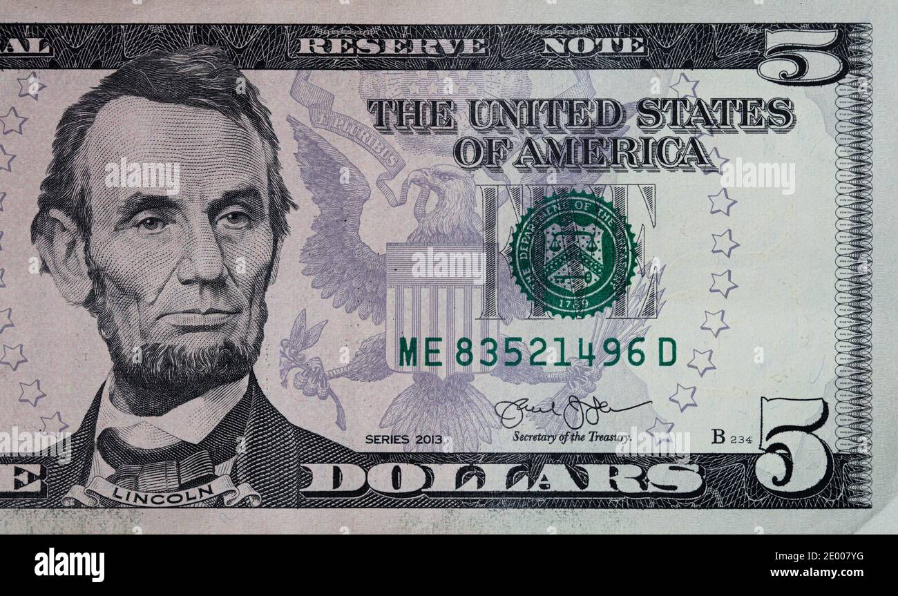 fragment of 5 dollar bill for design purpose Stock Photo