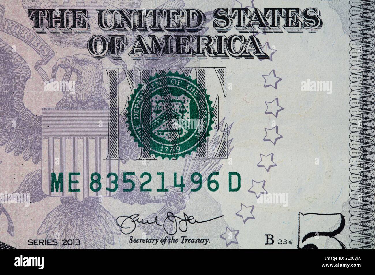 fragment of 5 dollar bill for design purpose Stock Photo