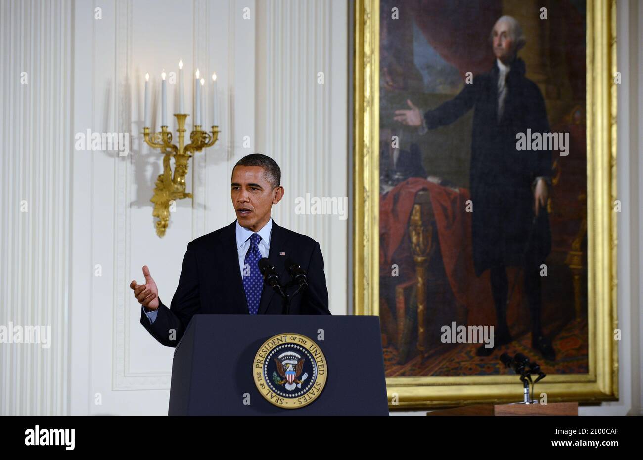 President Barack Obama delirers remarks before awarding Captain William Swenson, U.S. Army, the Medal of Honor during an ceremony in the East Room of the White House in Washington, DC, USA, October 15, 2013.Photo by Olivier Douliery/ABACAPRESS.COM Stock Photo