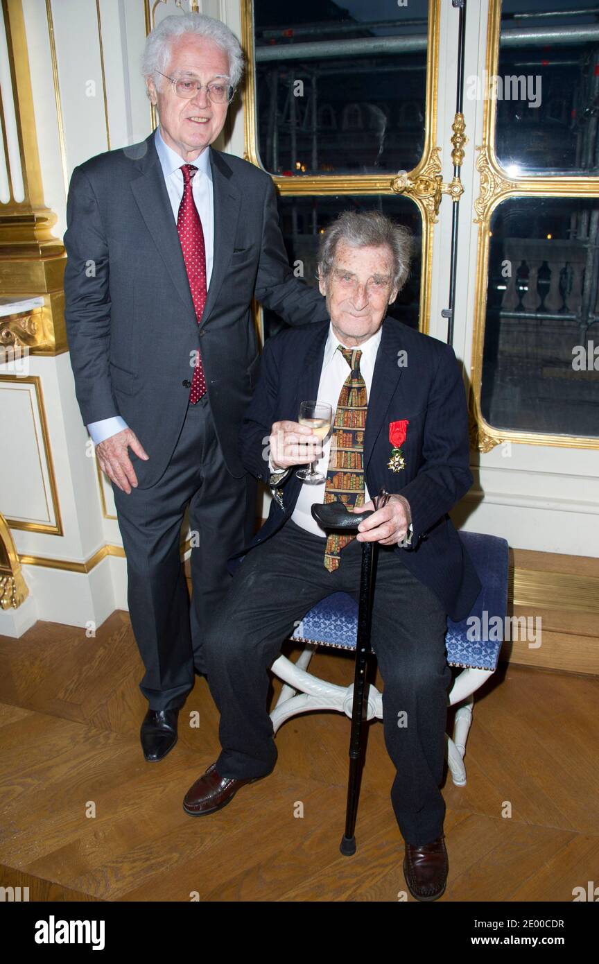 Lionel Jospin and Jean Lacouture pose for pictures after a ceremony where Jean  Lacouture has been awarded Grand Officier De La Legion D'Honneur at the  Culture Ministry in Paris, France on October 15, 2013. Photo by Laurent  Zabulon/ABACAPRESS ...
