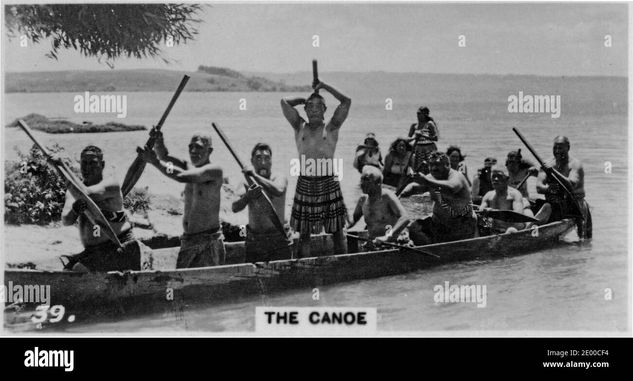 Maori warriors and their canoe, from a cigarette card on New Zealand history, circa 1930 Stock Photo