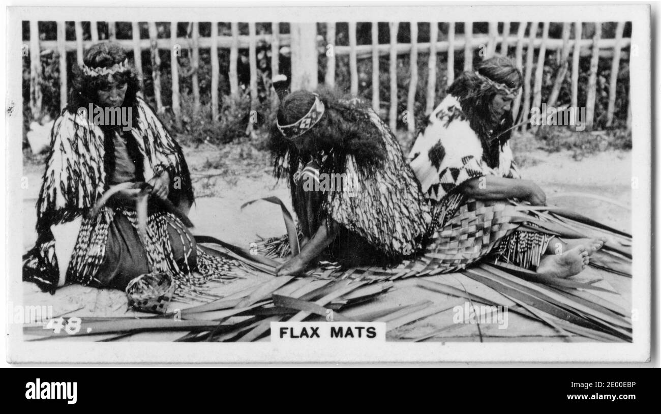 illustration of Maori women weaving flax mats, from a cigarette card on New Zealand history, circa 1930 Stock Photo