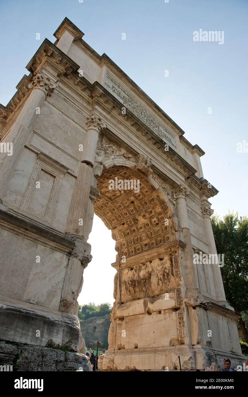 The fresco showing the Golden Menorah in the Arch of Titus, located on the Via Sacra, just to the south-east of the Roman Forum in Rome, Italy, which was built to commemorate Titus's victory in Judea, depicts a Roman victory procession with soldiers carrying spoils from the Temple, including the Menorah, which were used to fund the construction of the Colosseum, on Wednesday, October 23, 2013. It was constructed c. 82 AD by the Roman Emperor Domitian shortly after the death of his older brother Titus to commemorate Titus' victories, including the Siege of Jerusalem in 70 AD. The Arch is said t Stock Photo
