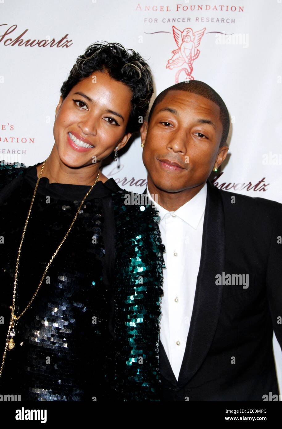 Wife pharrell williams helen lasichanh hi-res stock photography and images  - Alamy