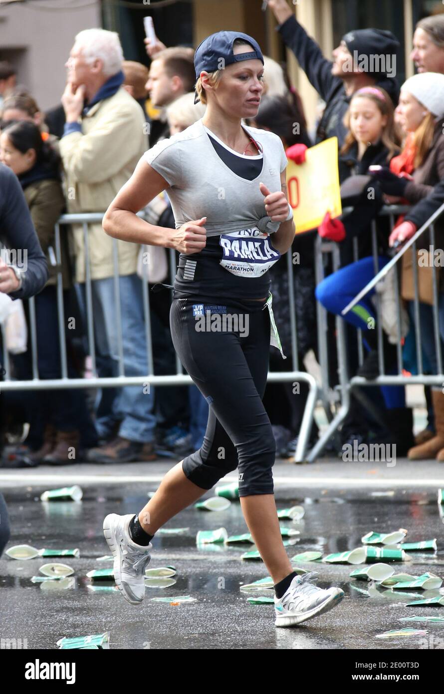 US actress Pamela Anderson is running with her brother Gerry The 2013