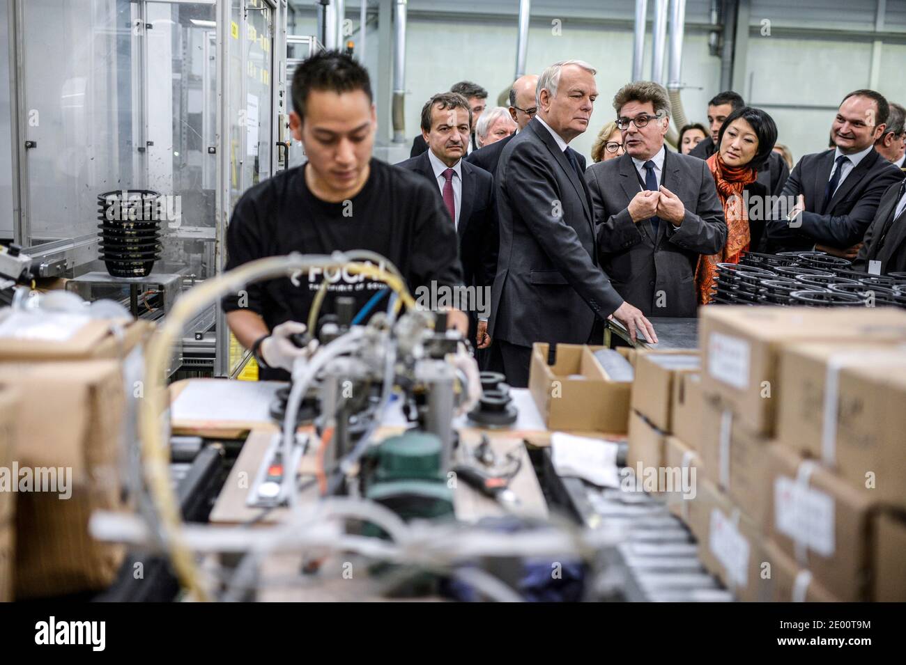 French Prime Minister Jean-Marc Ayrault (R) visits a Focal factory, in  Saint-Etienne, center France, on November 4, 2013. Photo by Jeff  Pachoud/Pool/ABACAPRESS.COM Stock Photo - Alamy