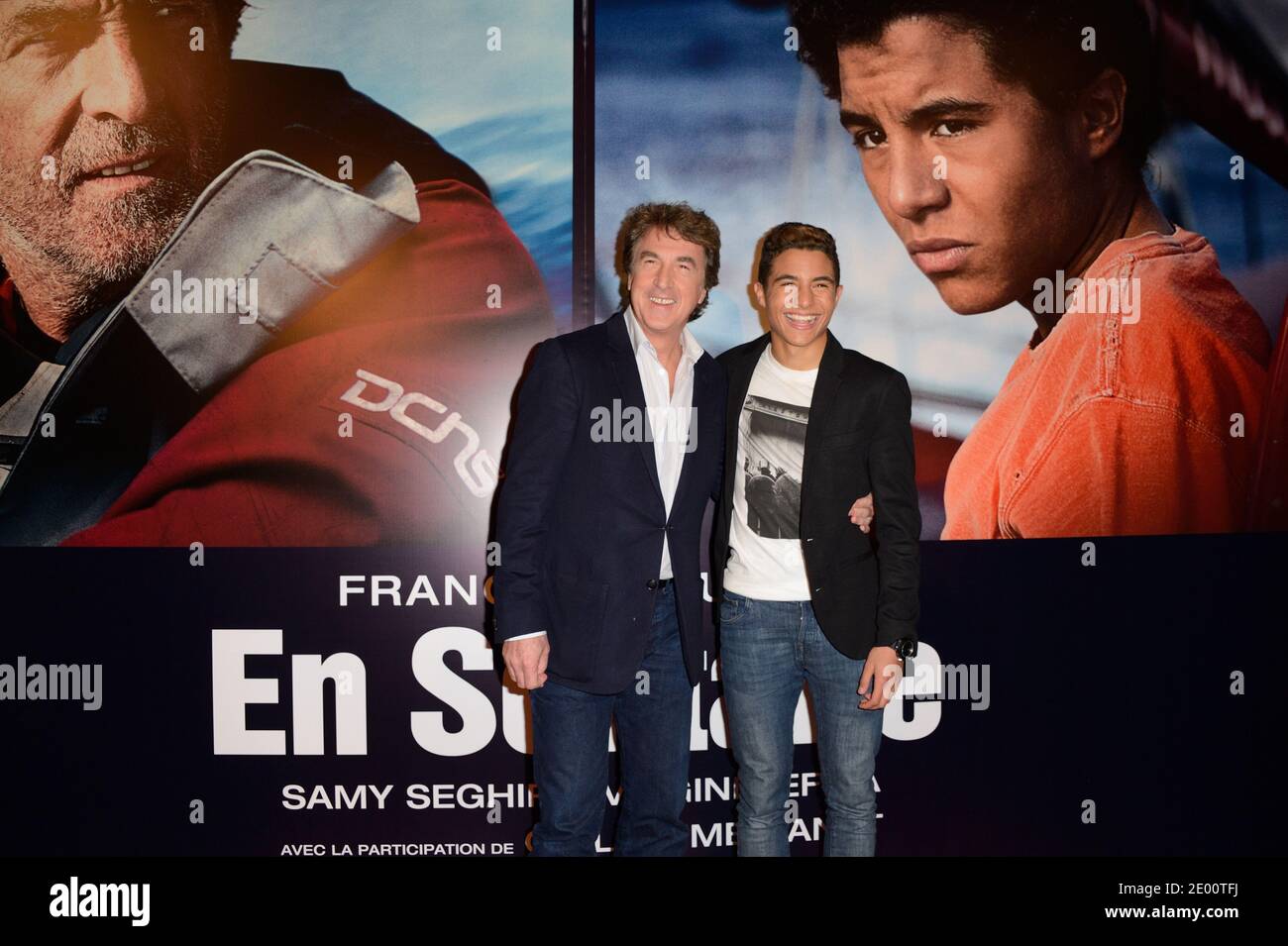 Francois Cluzet and Samy Seghir attending the premiere of the film En Solitaire held at the Cinema Gaumont Opera in Paris, France on November 4, 2013. Photo by Nicolas Briquet/ABACAPRESS.COM Stock Photo