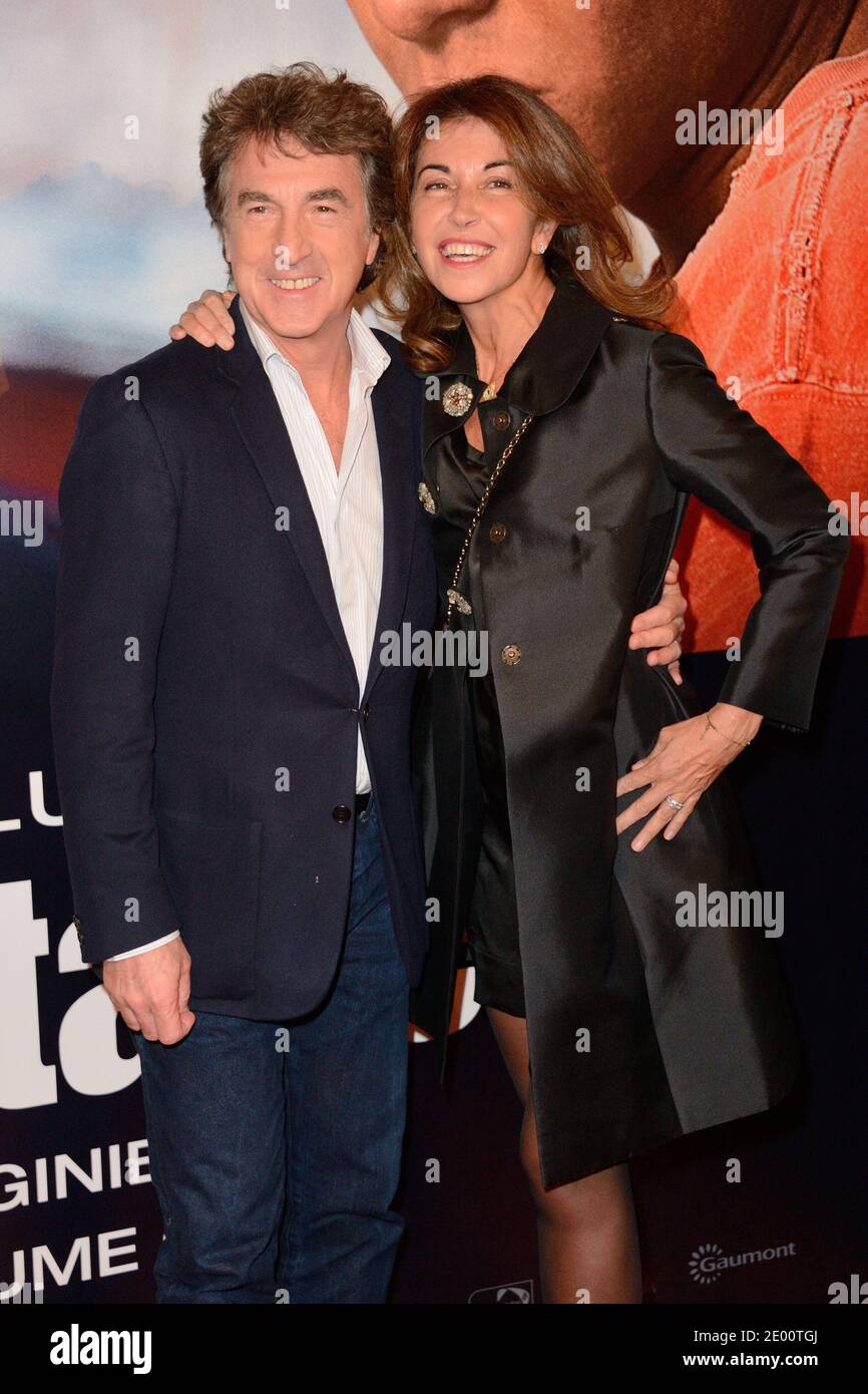 Francois Cluzet and his wife Narjiss attending the premiere of the film En Solitaire held at the Cinema Gaumont Opera in Paris, France on November 4, 2013. Photo by Nicolas Briquet/ABACAPRESS.COM Stock Photo