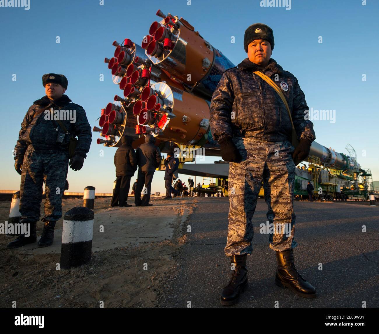 Security monitors the Soyuz TMA-11M rocket as it is rolled out to the launch pad by train on Tuesday, on November 5, 2013, at the Baikonur Cosmodrome in Kazakhstan. Launch of the Soyuz rocket is scheduled for November 7 and will send Expedition 38 Soyuz Commander Mikhail Tyurin of Roscosmos, Flight Engineer Rick Mastracchio of NASA and Flight Engineer Koichi Wakata of the Japan Aerospace Exploration Agency on a six-month mission aboard the International Space Station. Handout Photo by Bill Ingalls/NASA/CNP/ABACAPRESS.COM Stock Photo