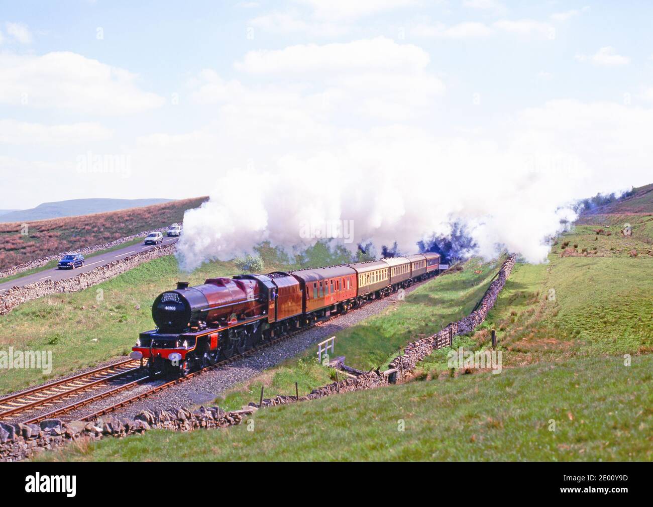 Cumbrian Mountain Express coming out of Shotlock Hill Tunnel, Settle to Carlisle railway, England Stock Photo