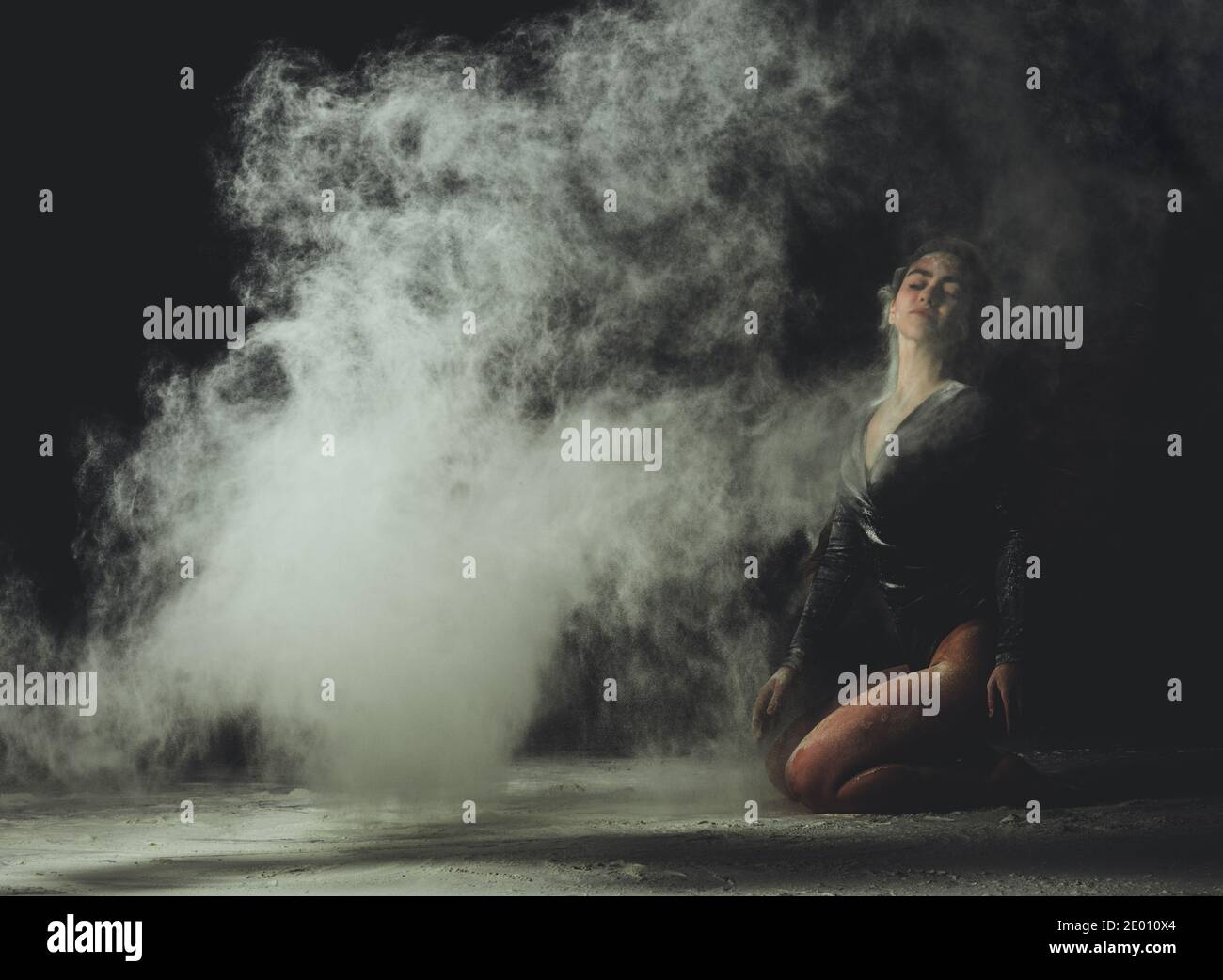 Woman powder throwing studio hi-res stock photography and images - Alamy