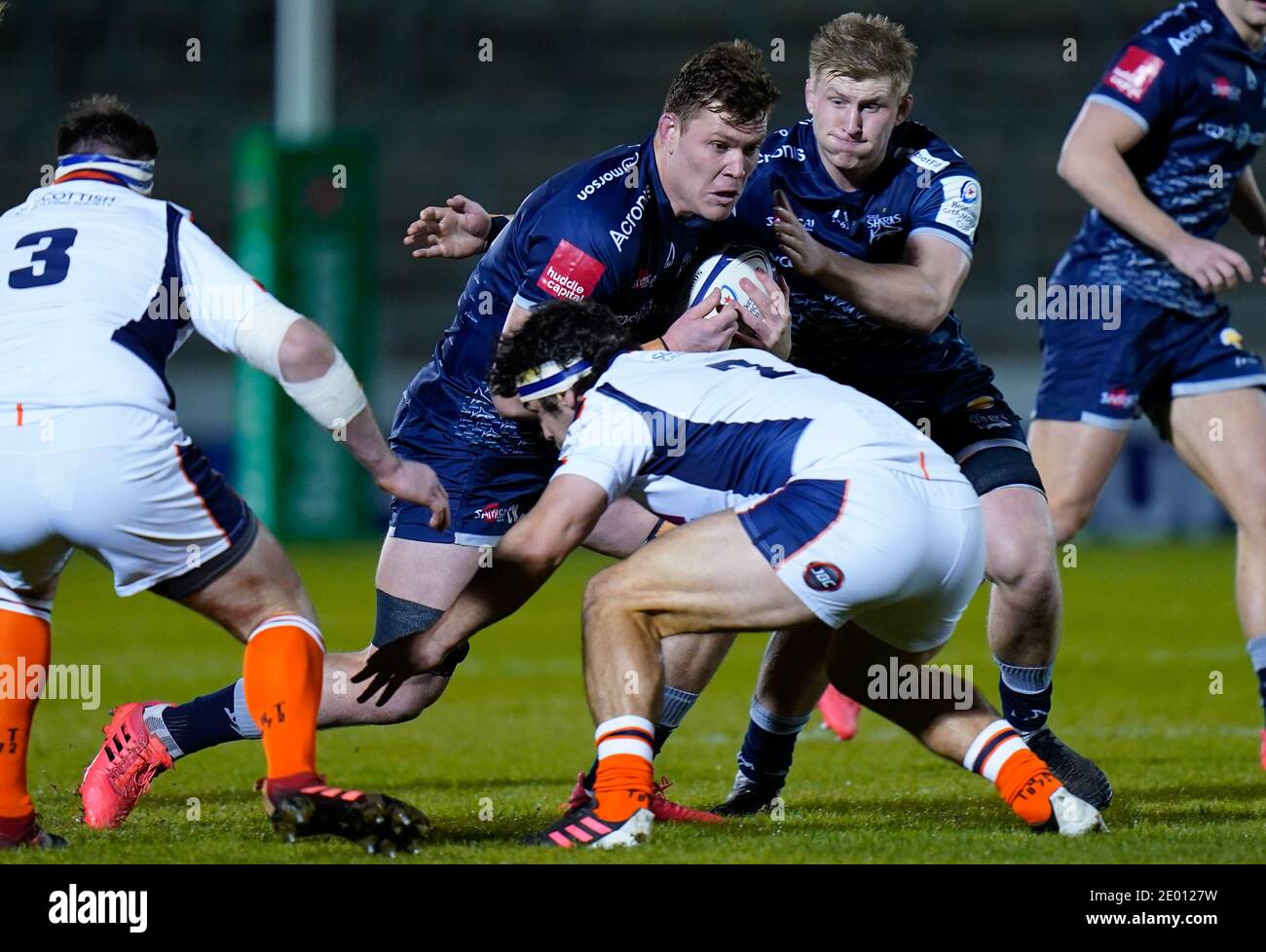 Sale Sharks flanker Cobus Wiese runs at the Edinburgh Rugby defence during the European Champions Cup match Sale Sharks -V- Edinburgh Rugby at The AJ Stock Photo