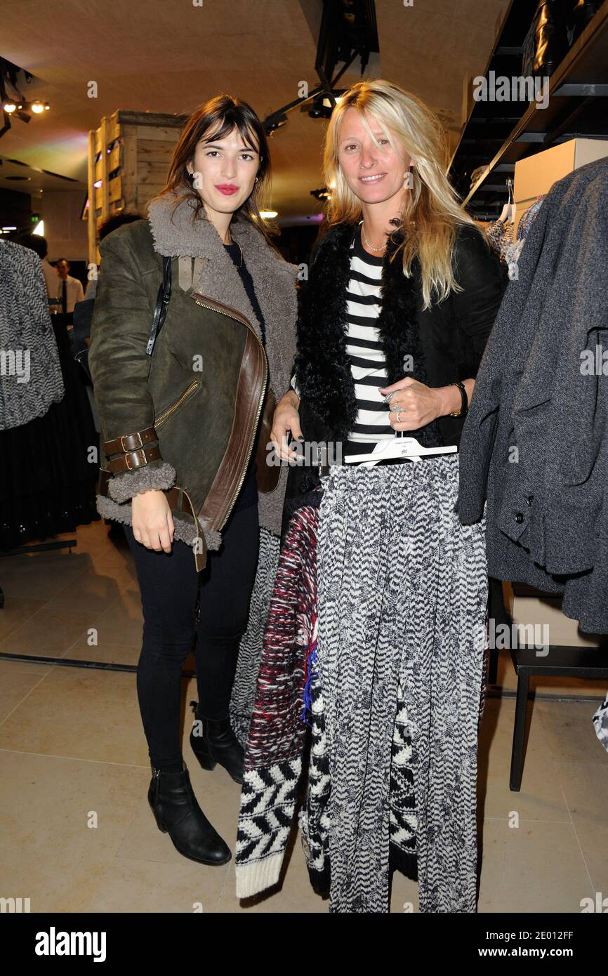 Jeanne Damas and Sarah Lavoine attending the Isabel Marant Pour H&M party  at H&M shop in Paris, France on November 13, 2013. Photo by Alban  Wyters/ABACAPRESS.COM Stock Photo - Alamy