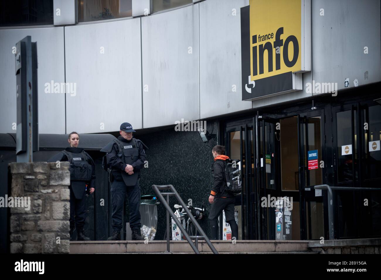 Police stands guards outside Radio France's headquarters building the  Maison de la Radio in Paris, France on November 18, 2013. Three days after  a shooting at the BFM-TV news network, today a