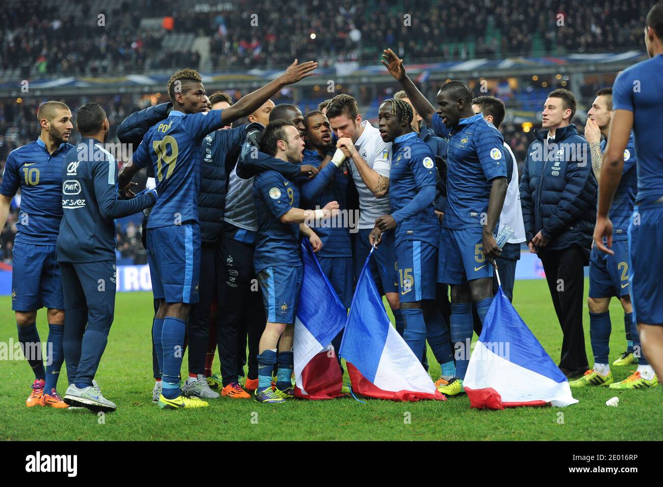 French team celebrates after winning the 2014 FIFA World Cup Europe Group  play-off football match, France Vs Ukraine at Stade de France in  Saint-Denis suburb of Paris, France on November 19, 2013.