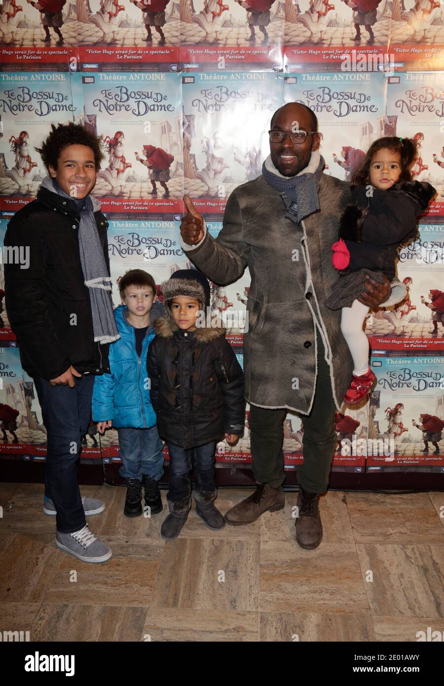 Lucien Jean-Baptiste and his children attending the premiere of 'Le Bossu  De Notre Dame held