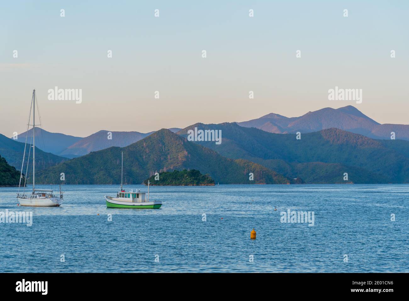 Boats mooring at Queen Charlotte sound in Picton, New Zealand Stock