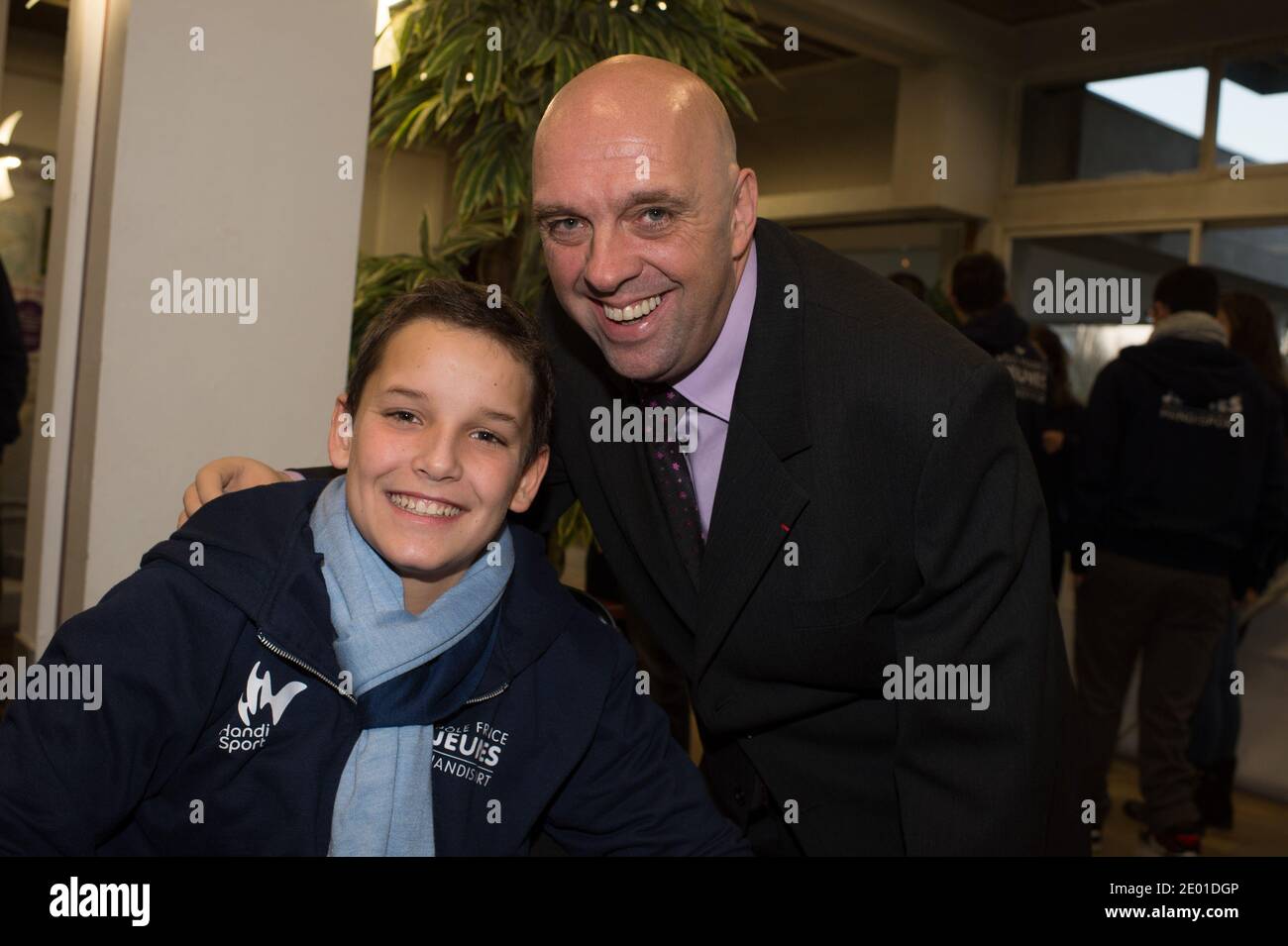 Theo, a 13-year-old 4-limb amputee poses along with four-member amputee swimmer Philippe Croizon on November 27, 2013 in Vichy, central France. Theo is a grant holder of the disabled sports branch of the French Expertise and Performance Ressource Centre (CREPS) of Vichy Auvergne, where he trains in swimming. In early 2013, he competed for the first time in the French disabled swimming championships. Photo by Christophe Guibbaud/ABACAPRESS.COM Stock Photo