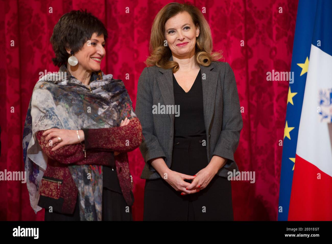 French President Francois Hollande's companion Valerie Trierweiler and Junior Minister for the Disabled Marie-Arlette Carlotti during the annual awarding ceremony of La Medaille de la Famille Francaise (Medal of the French Family), at the Elysee Palace in Paris, France on November 30, 2013. The award is to honour those who have successfully raised several children with dignity. Photo by Nicolas Gouhier/ABACAPRESS.COM Stock Photo